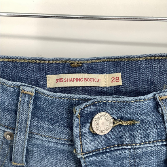 Levis Women's 28 Blue Light Wash Denim 315 Shaping Bootcut Jeans Mid Rise L3-3 - Picture 4 of 9